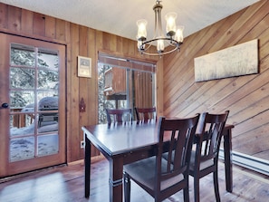Dining area with seating for four guests