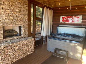 Hot Tub and Fireplace on Basement wrap around screened in porch