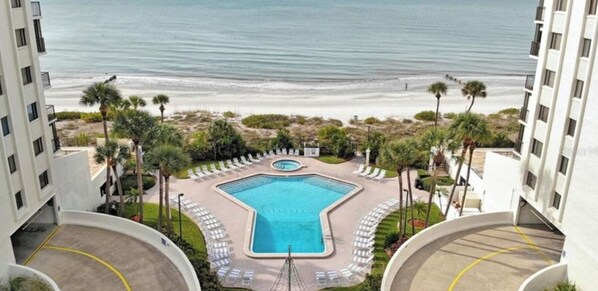 Large heated fresh water pool and hot tub that overlooks the beach and Gulf.  