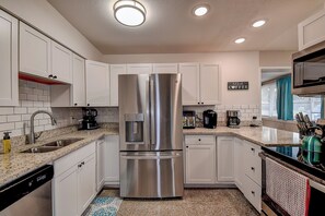 Enjoy home-cooked meals with ease in this kitchen