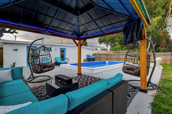 Unwind in style in the gazebo with TV. #OutdoorLiving
