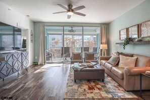 Hello Sunshine!  The open floor plan enjoys sunlight as it pours in from the sliding glass doors of the Lanai