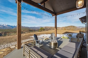 Covered outdoor space - Awesome views, private hot tub, gas fire put, couches etc.