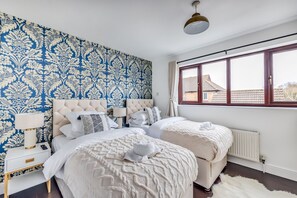 Bedroom 1 has zip link beds configured as two single beds by default or can be zipped together as a king size bed upon request.