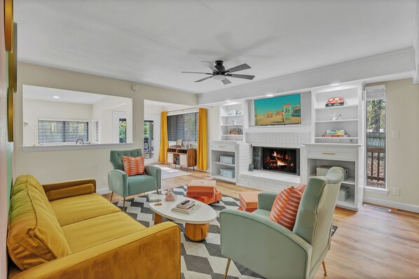 Wes Anderson-themed living room with fireplace