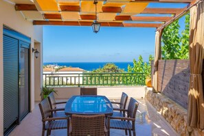 Upper terrace area with sea views