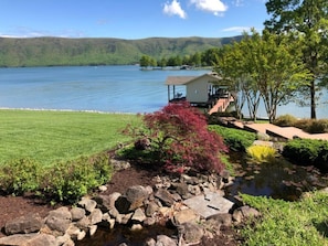 Enjoy easy lake access with a gently sloped lawn that is perfect for relaxing.