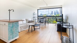  Enjoy the spacious, open-plan layout of this simple and comfortable apartment, designed for easy living.