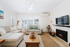 Kick back in the living room with books, board games and a TV for your entertainment.
