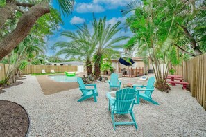 Fire pit with Adirondack chairs