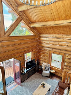 3rd floor open loft views of the living room with gorgeous natural light.