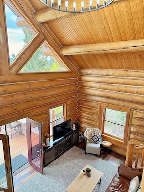3rd floor open loft views of the living room with gorgeous natural light.