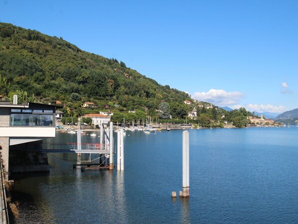 Water, Sky, Water Resources, Mountain, Building, Cloud, Azure, Coastal And Oceanic Landforms, Lake, Bank