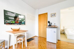 This cozy studio features everything you need for a pleasant stay, from a kitchenette to a comfy seating area.  Book now for a hassle-free stay!