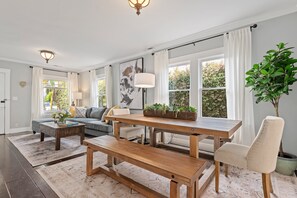 Large dining table can accommodate up to 8!
