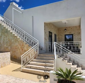 Steps up to rooftop terrace