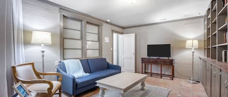 Enjoy a great book or stream your favorites on the smart TV in the living room