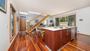 Open plan kitchen and dining on to living