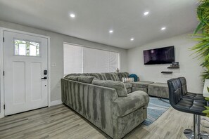 Cozy living room with a comfy couch and smart TV #LivingRoomVibes
