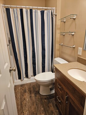 Bathroom off the garage to wash off after a day of fun.