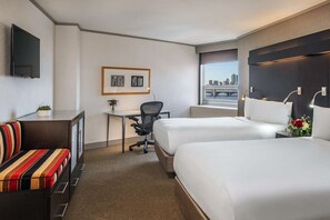Unit with 2 Double beds. Exact unit will be assigned upon arrival. Views, colors, and decor may vary.