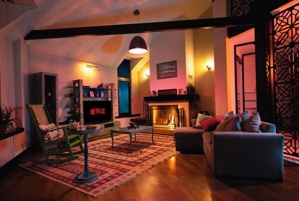 Tbilisi Bliss Penthouse - Incredible lounge area with fireplace.