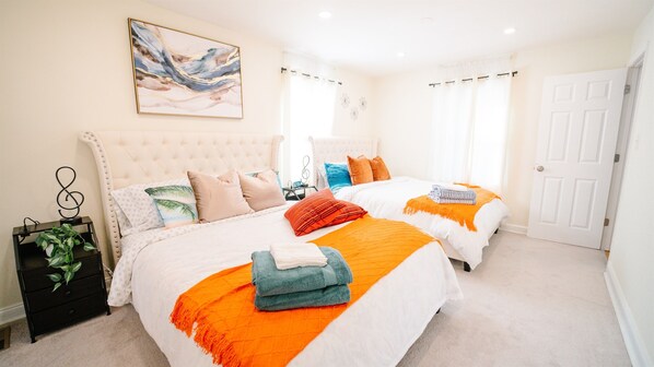 2 Queen beds and One 55 inch TV sleeps 4
