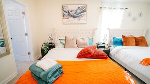 2 Queen beds and One 55 inch TV sleeps 4