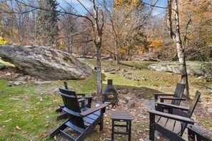 Chiminea with Adirondack Seating next to the 'Silver Rock'