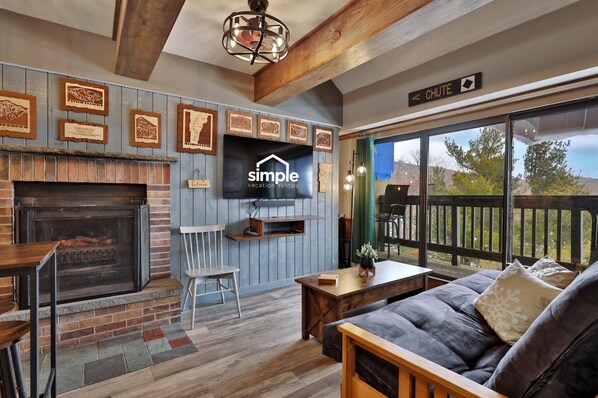 Mountain Green 2F8 offers you a cozy living space with your private balcony and fireplace.