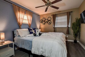 Master bedroom featuring a king bed #MasterRetreat #ComfortableStay