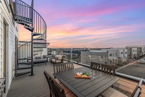 Multiple lounge areas, BBQ grill with warming drawers, and griddle. Private access to the primary bedroom. (3rd Floor)