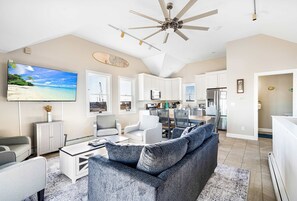 Main living area with large TV and ample seating.  Spectacular views all around!