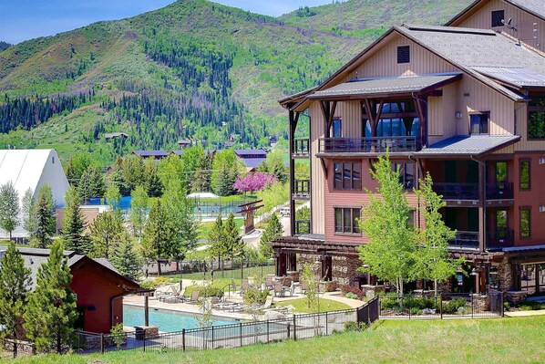 Our condo offers pool and hot tub access with the mountain right there!