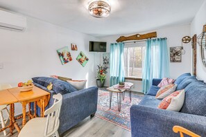 Studio | Living Room | Queen Sleeper Sofa | Twin Sleeper Sofa | Flat-Screen TV