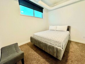 Master bedroom with queen bed