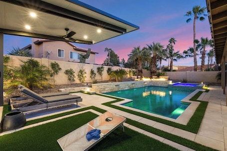 Stunning pool, cozy fire features, and lush landscaping – your perfect getaway under the stars!