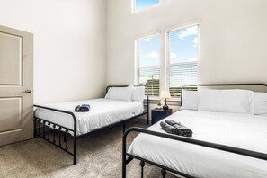 As you enter the bedroom, the comfortable bedding and peaceful atmosphere create the perfect retreat from the day.