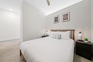 As you enter the bedroom, the sophisticated decor and plush bedding create a space where you can truly unwind.
