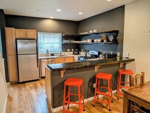 Breakfast bar with 3 stools.