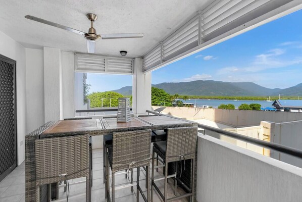 Take in glistening views over the water from your balcony, which comes with alfresco dining.