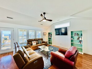 The 3rd floor is a large open floor plan with the Livingroom, Kitchen and Dining room