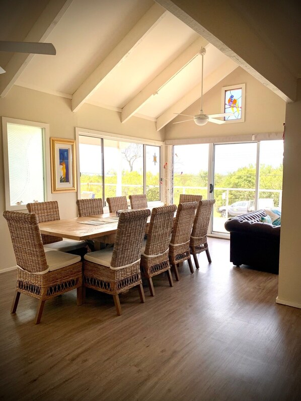 Main open plan living and dining area with views of the ocean