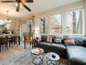 Sunny and spacious living area with lots of natural light.