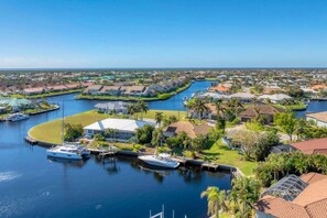 This meticulously maintained and fully remodeled home is situated on a peaceful cul-de-sac, offering the ultimate Florida lifestyle with sailboat access to Charlotte Harbor and the Gulf via Buckley Pass.
