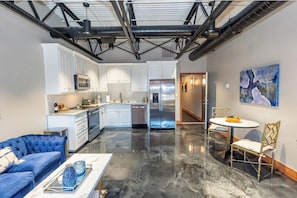 Living Room, Dining Space, and Full Kitchen