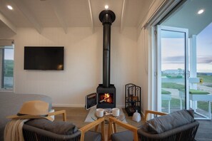 Cosy up by the fire with a view