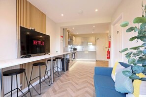 This property does not include a separate living room; the kitchen area serves as the primary communal space for dining and relaxation.