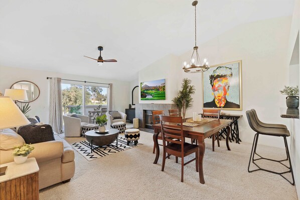 Unwind in the bright living area with golf course view