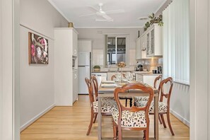 Come together for a shared meal around the dining table or take things out onto the patio.
